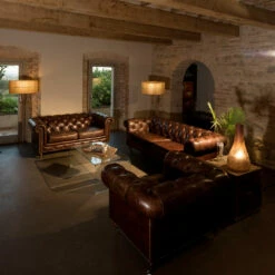 Woonkamerfauteuil In Vintage Leer Met Verouderd Effect Met Wielen En Armleuningen - Stempel -Slide Shop poltrona da salotto in cuoio vintage effetto invecchiato con ruote e braccioli timbro 4